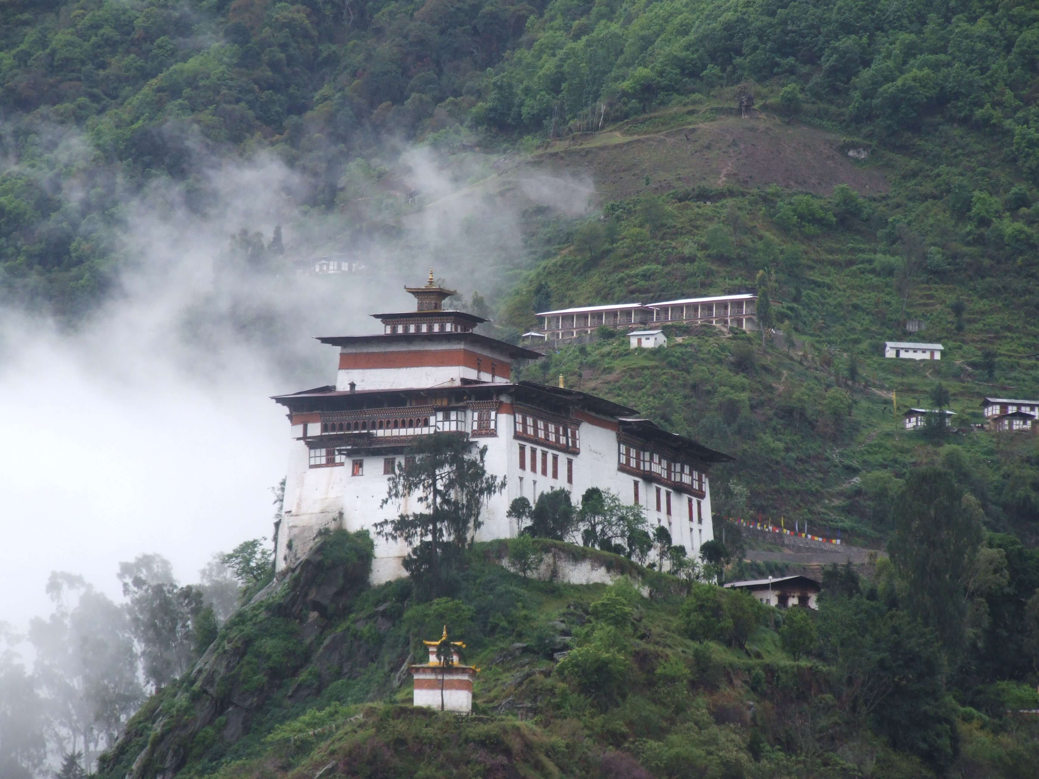 Lhuentse Dzong surrounded by clouds – hidden place in Bhutan