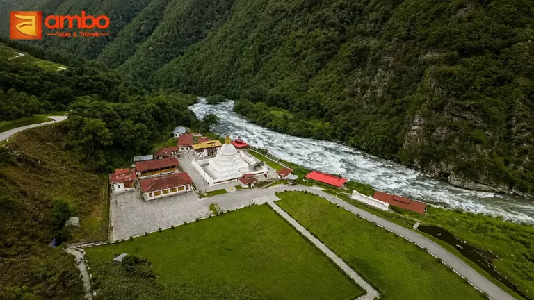 Pilgrims circumambulating the Chorten Kora stupa on the banks of the Kholong Chhu river in Trashiyangtse, eastern Bhutan, during the Chorten Kora Festival