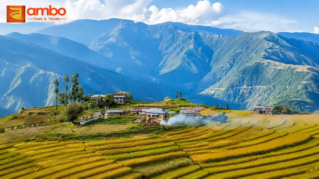 Traditional village with timber and stone houses on an eastern Bhutan tour