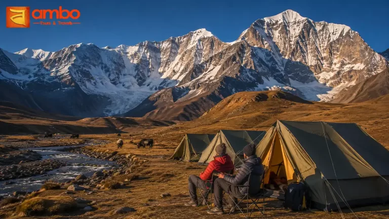 Trekkers at Nulithang camp beneath the north face of Masagang (7,194m) and Tsenda Kang (7,000m) in the Laya highlands of northern Bhutan