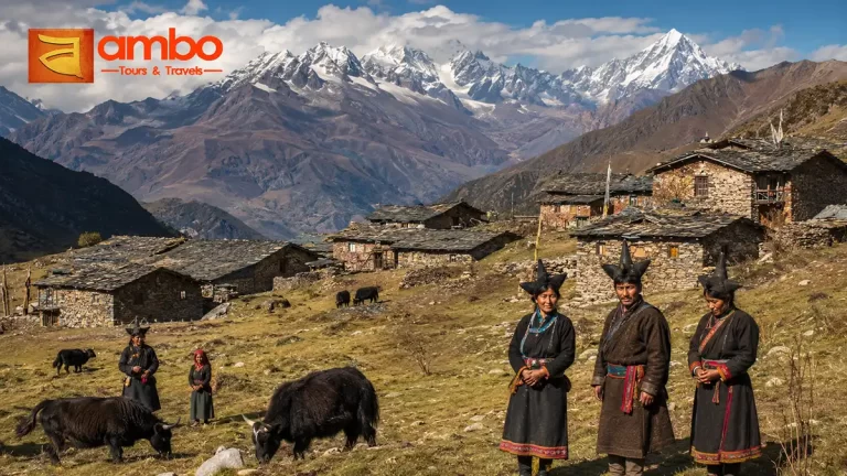 Brokpa villagers in traditional yak-hair dress outside stone houses in Merak village at 3,145m in eastern Bhutan on the Merak Sakteng Trek