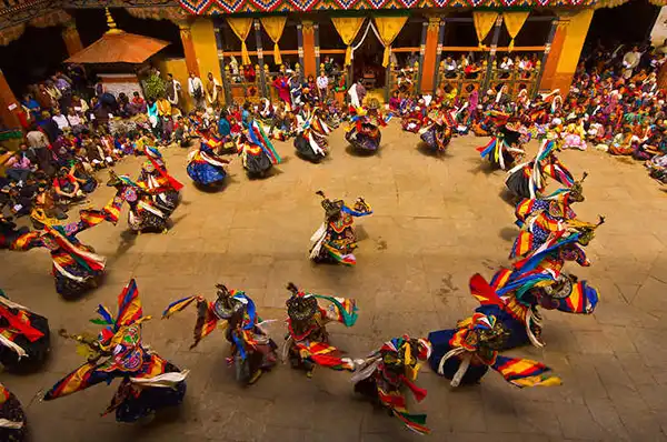 Monks performing Cham dance at a Bhutan festival